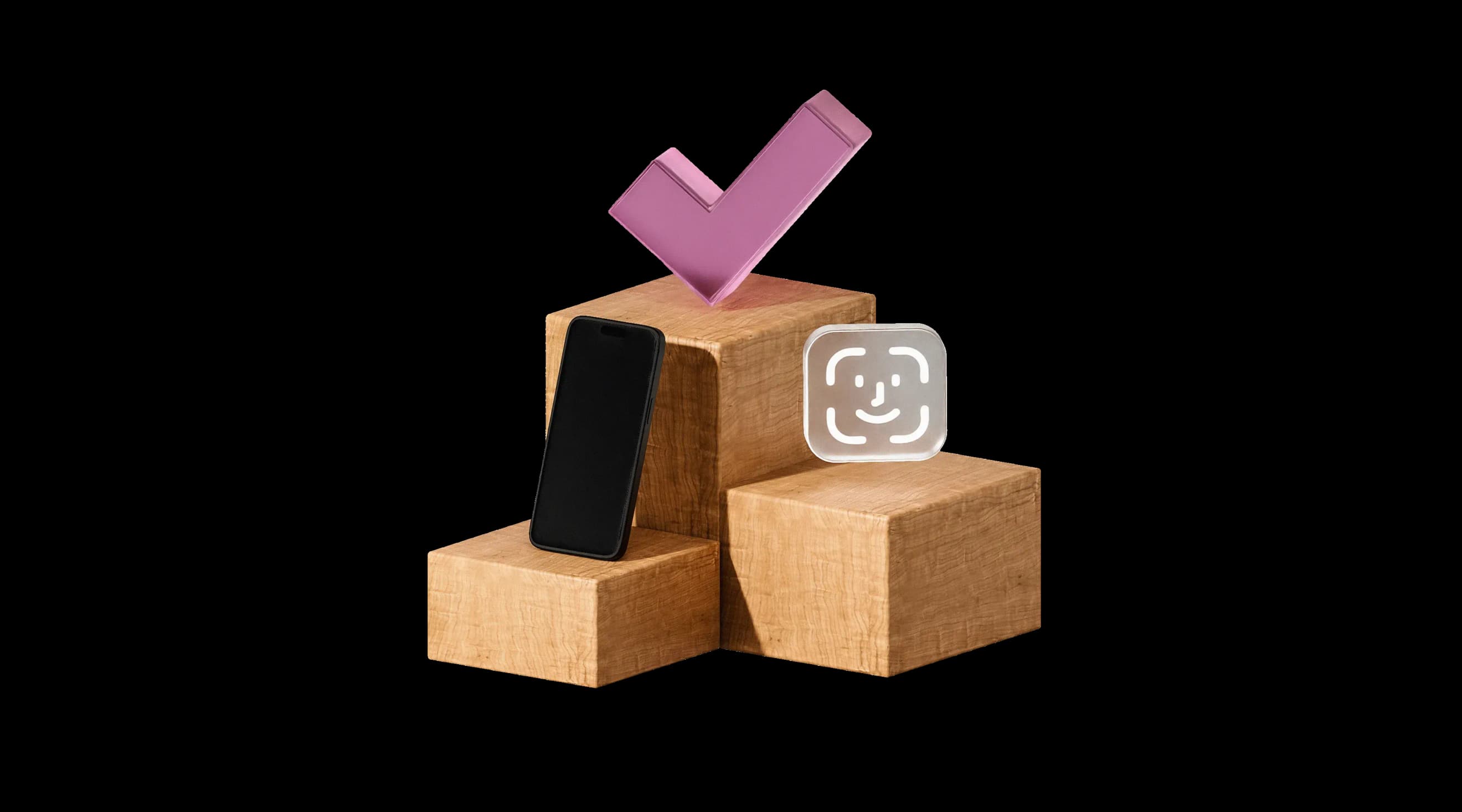 Смартфон, великий рожевий чек‑маркер і значок розпізнавання обличчя на дерев’яних кубах Смартфон, великий рожевий чек‑маркер і значок розпізнавання обличчя на дерев’яних кубах